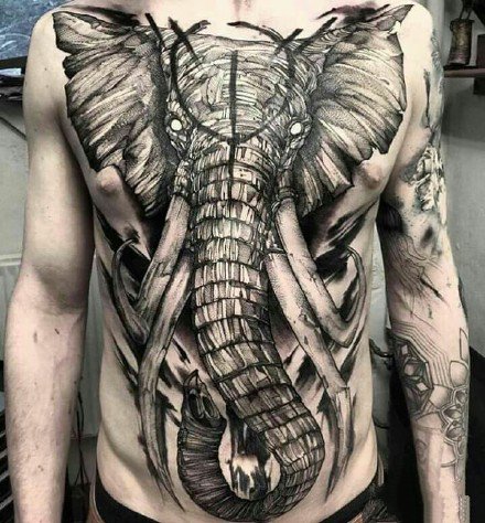 点击大图看下一张：霸气的一组大象和象神纹身作品图案