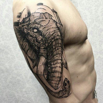 点击大图看下一张：霸气的一组大象和象神纹身作品图案
