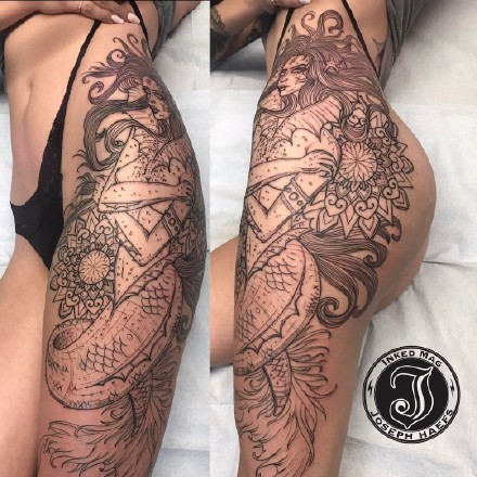 点击大图看下一张：女性大腿侧到臀部的性感纹身图片