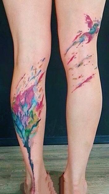 点击大图看下一张：唯美的腿部水彩色漂亮纹身图片