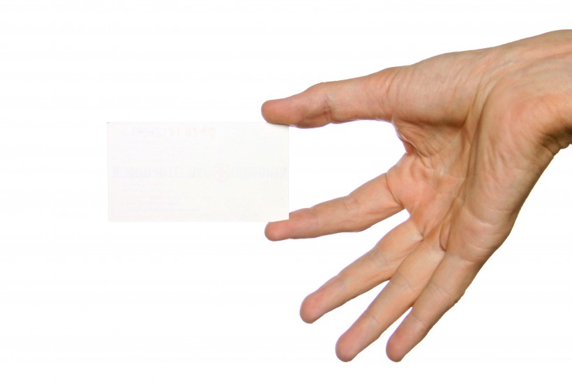 点击大图看下一张:手拿空白名片图片