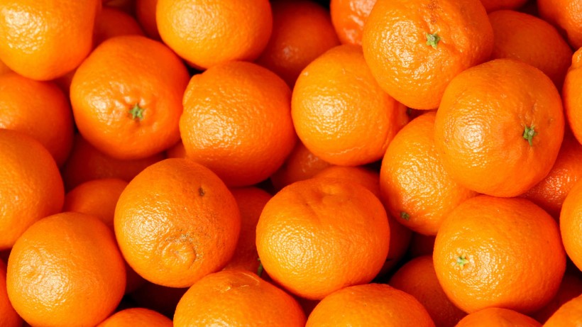 点击大图看下一张：新鲜橘子图片