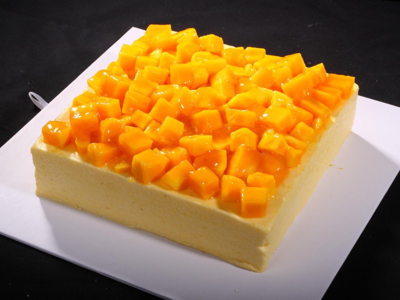 点击大图看下一张：美味的芒果水果蛋糕图片