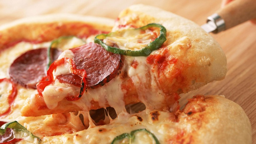 点击大图看下一张：美味的披萨图片