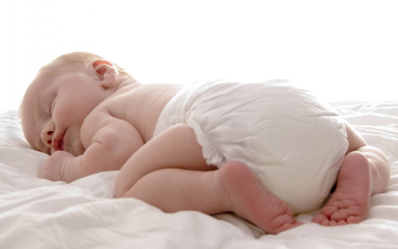 点击大图看下一张：睡梦中可爱婴儿图片