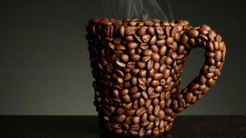点击大图看下一张：精致咖啡杯特写图片