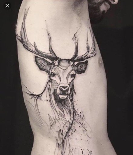 点击大图看下一张：黑灰色的一组鹿头纹身图案