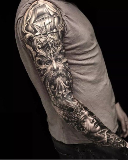 点击大图看下一张：欧美写实风格的经典手臂纹身作品