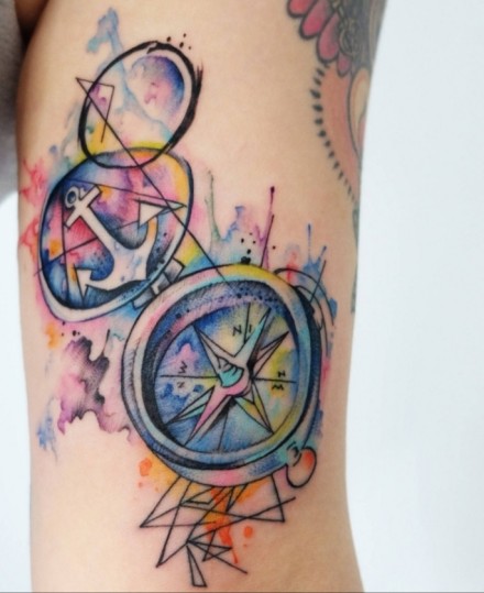 点击大图看下一张：指南针主题的一组钟表纹身图案