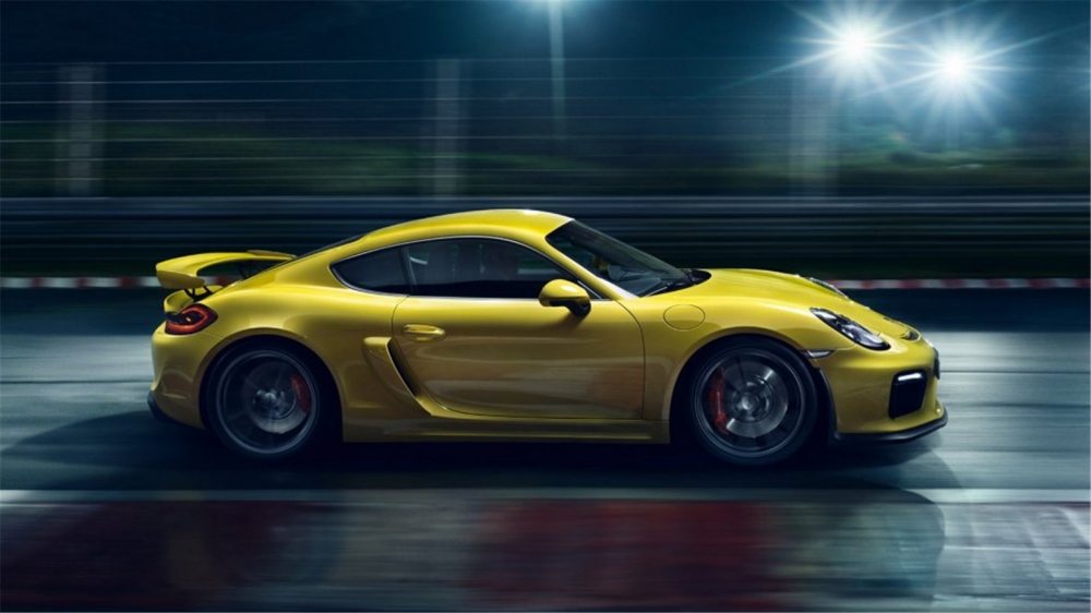 点击大图看下一张：黄色保时捷Cayman GT4跑车汽车高清壁纸