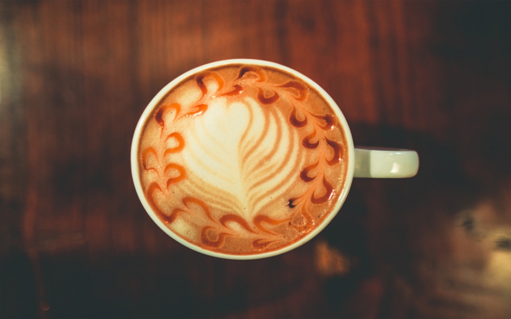 点击大图看下一张：制作精美的咖啡拉花，让人感觉清香扑鼻，提神醒脑