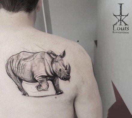 点击大图看下一张：一组寓意强壮的犀牛纹身图案