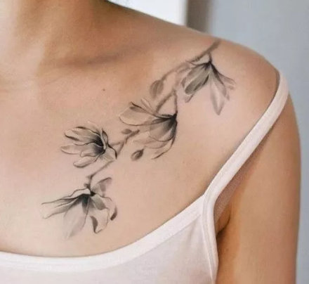 点击大图看下一张：别致优雅的9张玉兰花纹身图案