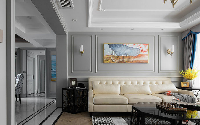 点击大图看下一张：现代美式风三居室装修设计，精致典雅的灰色调给人一种高级感’