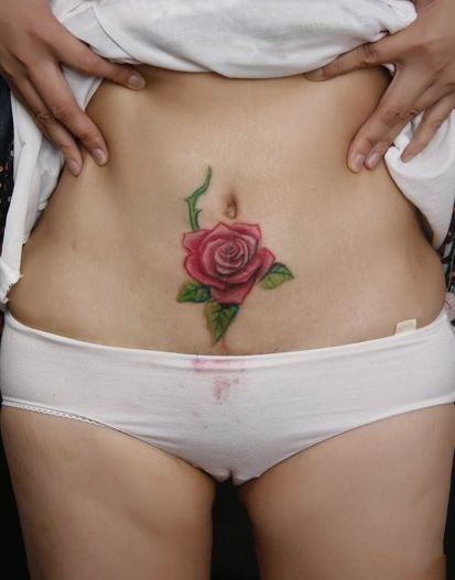 点击大图看下一张：9张女性腹部剖腹产遮盖疤痕纹身作品