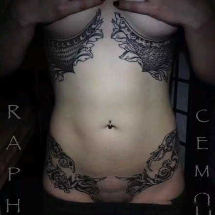 点击大图看下一张：9张女性腹部剖腹产遮盖疤痕纹身作品
