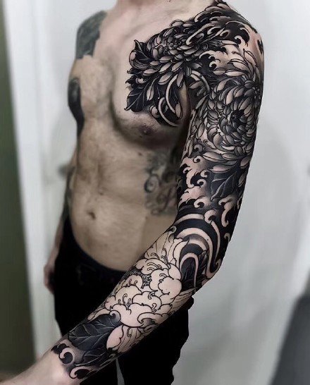 点击大图看下一张：9张男性帅气的大花臂纹身作品