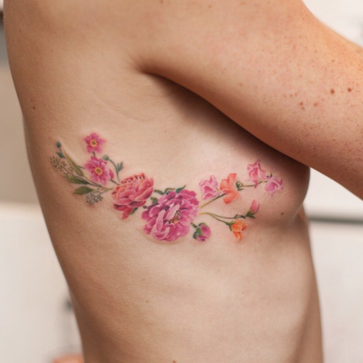 点击大图看下一张：小花朵纹身图案 10张身体各部位彩绘花朵植物叶子纹身图案