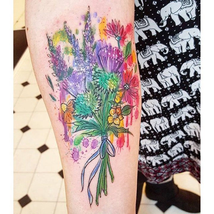点击大图看下一张：纹身图花朵   9张婀娜多姿的花朵纹身图案