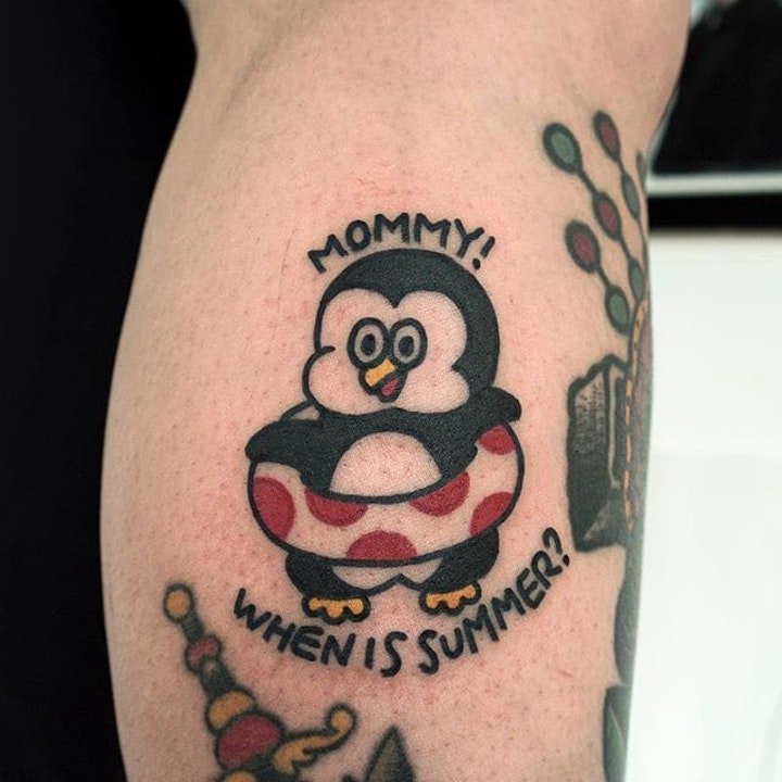 点击大图看下一张：企鹅纹身图   10款呆萌圆润的企鹅纹身图案