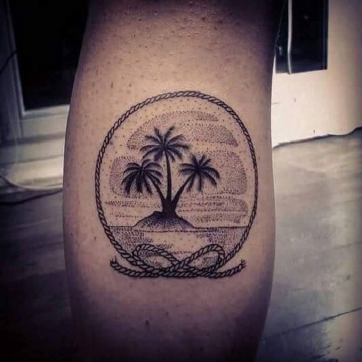 点击大图看下一张：椰树纹身图  简约与多彩并存的椰树纹身图案