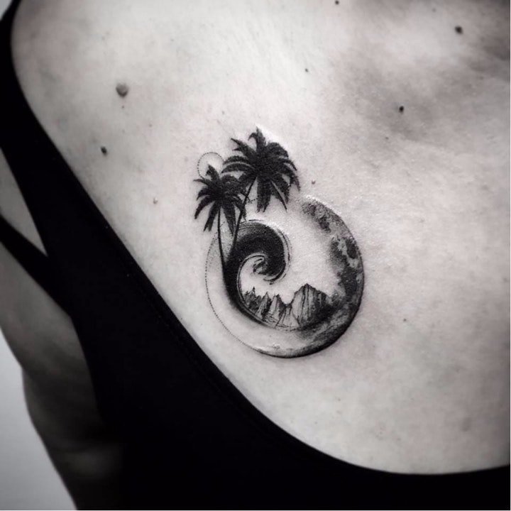 点击大图看下一张：椰树纹身图  生机蓬勃的椰树纹身图案