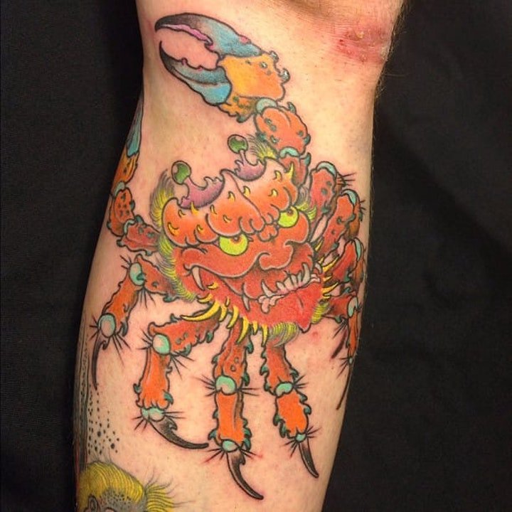 点击大图看下一张：螃蟹纹身图案  多款横行霸道的鬼面螃蟹纹身图片