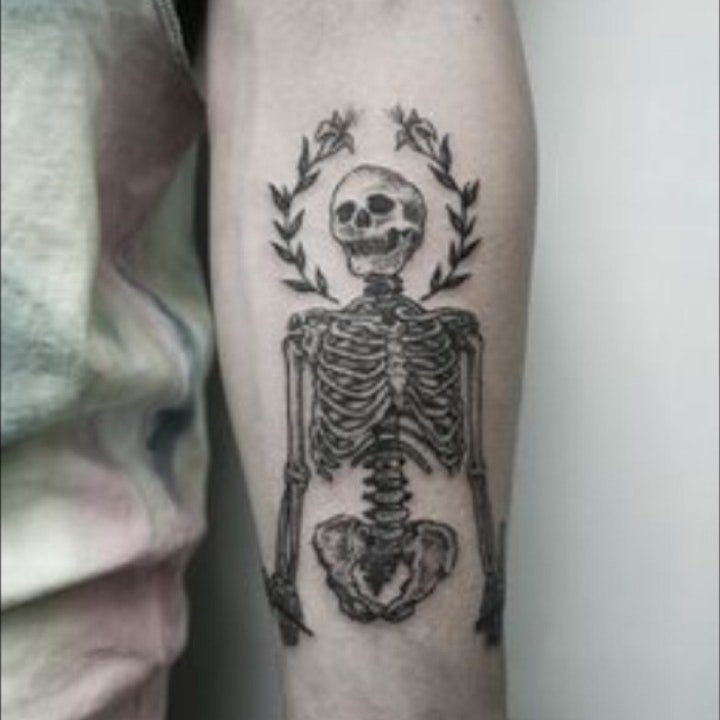 点击大图看下一张：纹身骷髅   9款奇趣而又恐怖的骷髅纹身图案