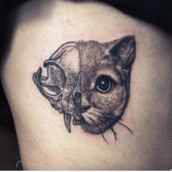 点击大图看下一张：猫的纹身图案   可爱而又灵动机灵的猫纹身图案