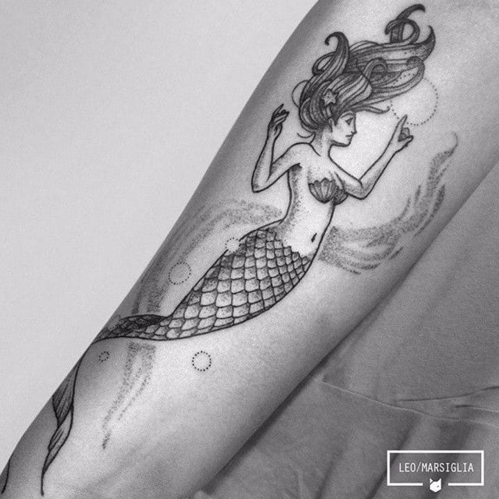 点击大图看下一张：纹身美人鱼    9张美丽善良的美人鱼主题纹身图案