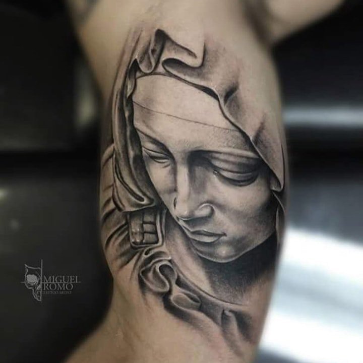 点击大图看下一张：圣母纹身图  万古颂扬的圣母怜子纹身图案
