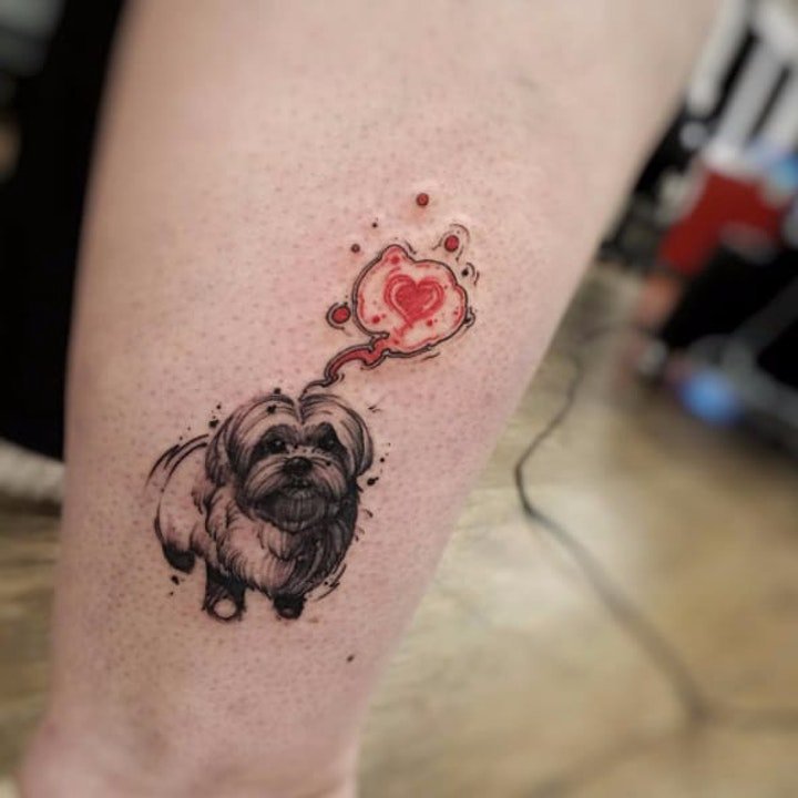 点击大图看下一张：狗纹身图案 10款各种不同色调与风格的小狗纹身图案
