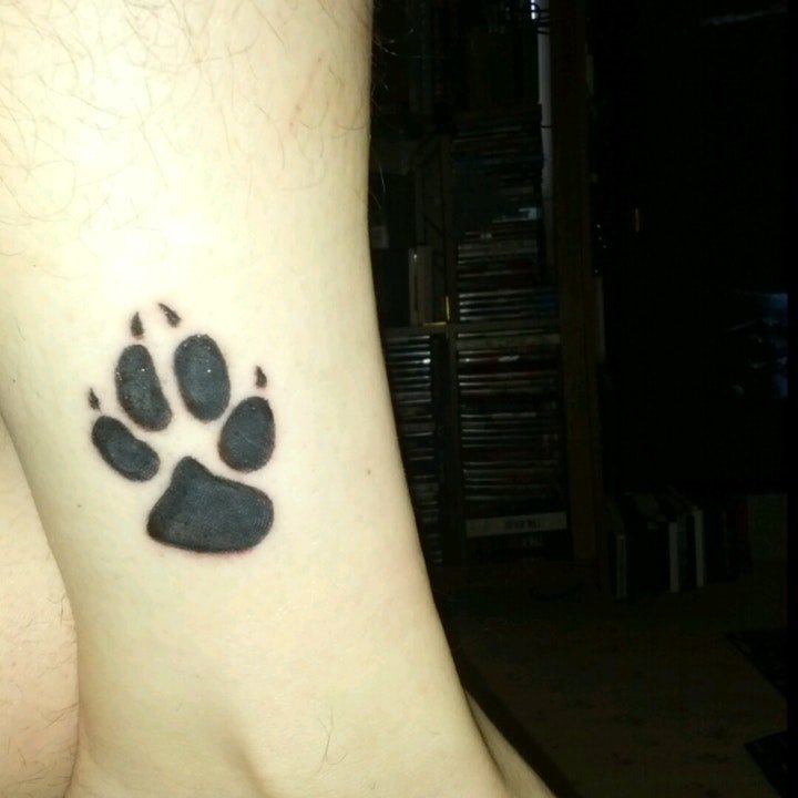 点击大图看下一张：爪印纹身图案 10张黑色纹身可爱的狗爪子纹身图案
