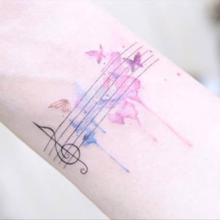 点击大图看下一张：音符纹身  跃动在肌肤之间的音符纹身图案9张