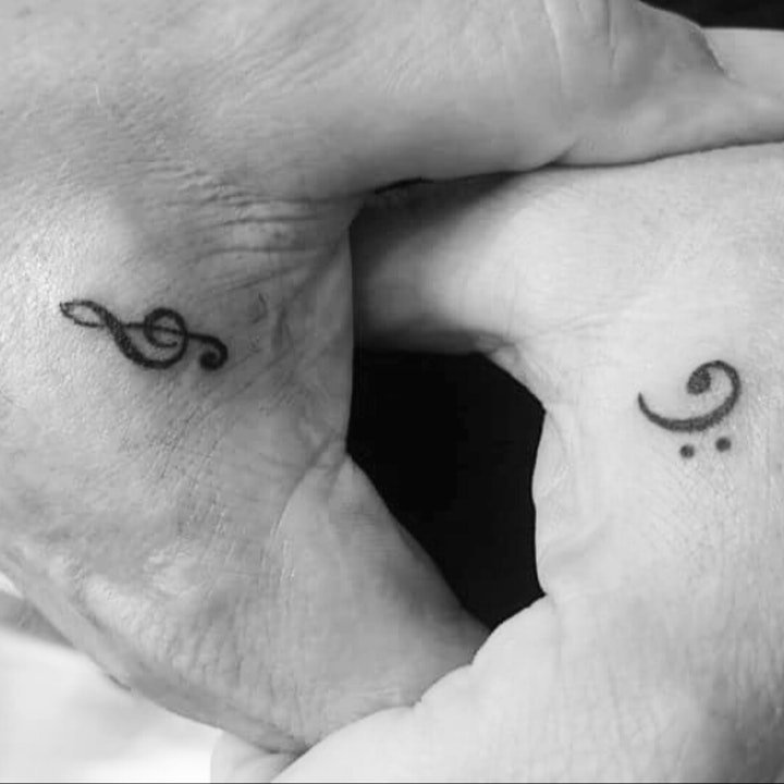 点击大图看下一张：音乐符号纹身   8款婉转动听的音乐主题纹身图案
