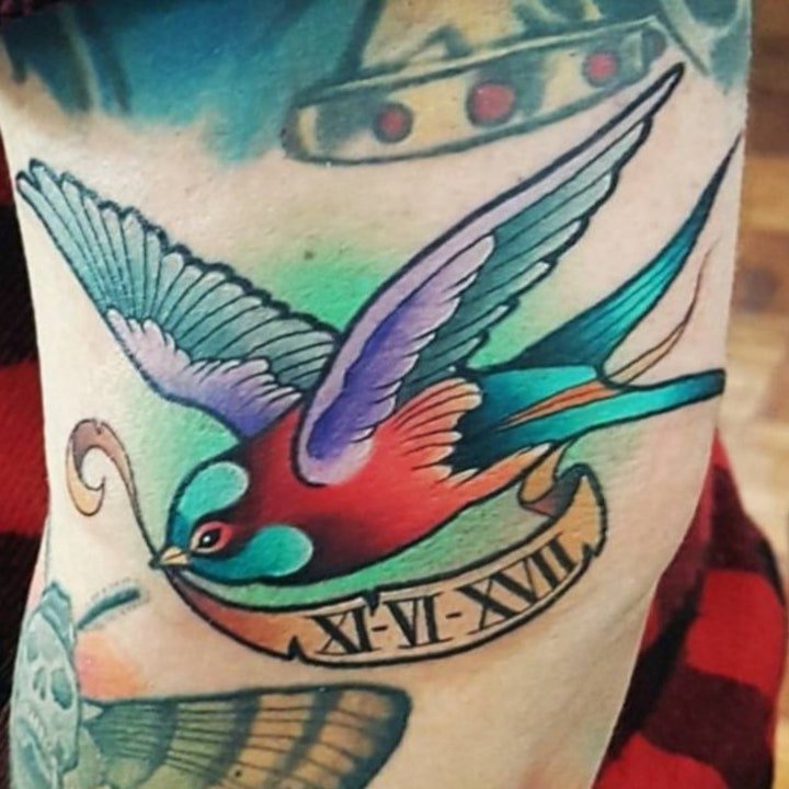 点击大图看下一张：纹身燕子   多款喧闹活跃的燕子纹身图案