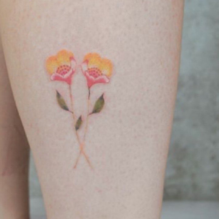 点击大图看下一张：小清新文艺纹身 女生身体各部位植物花朵等小清新文艺纹身图案