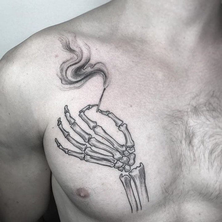 点击大图看下一张：骨头纹身图案   9张技巧多样的骨头纹身图案