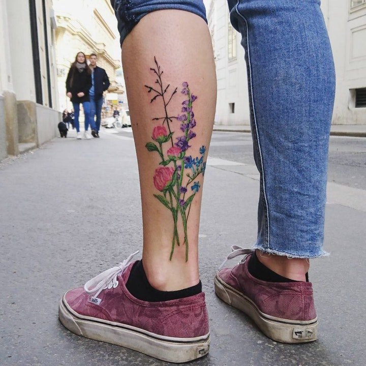 点击大图看下一张：纹身清新小图片   清新而又靓丽色调的花朵纹身图案