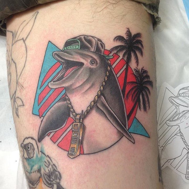 点击大图看下一张：纹身海豚   多款灵动而又可爱的海豚纹身图案