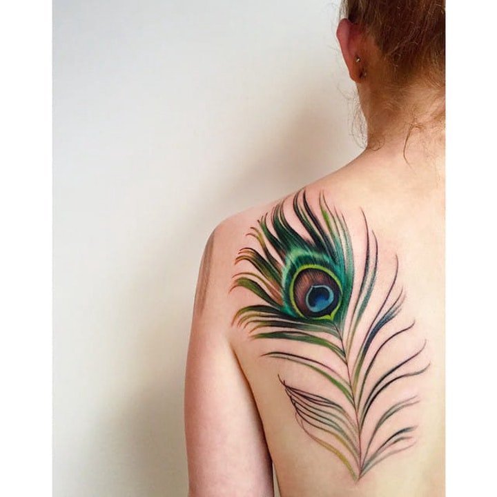 点击大图看下一张：孔雀纹身图案 10款多彩的孔雀和羽毛纹身图片