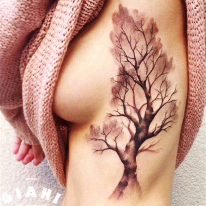 点击大图看下一张：纹身树木的图像  生机勃勃的树木纹身图案