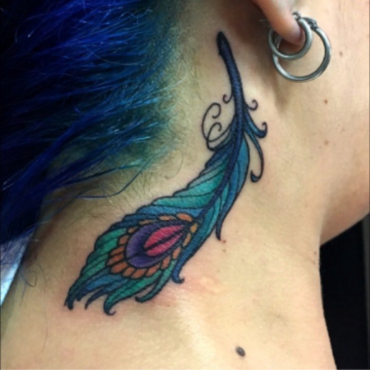 点击大图看下一张：孔雀羽毛纹身 时尚美艳的孔雀羽毛纹身图案