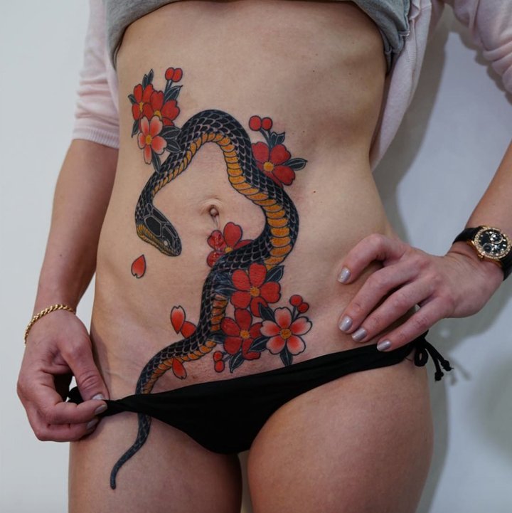 点击大图看下一张：纹身日式    色调别致而又吸睛的日式纹身图案