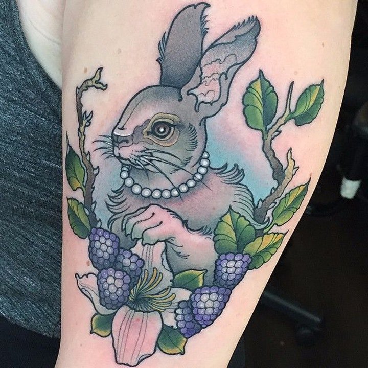 点击大图看下一张：可爱兔子纹身  一组温和灵动的兔子纹身图案