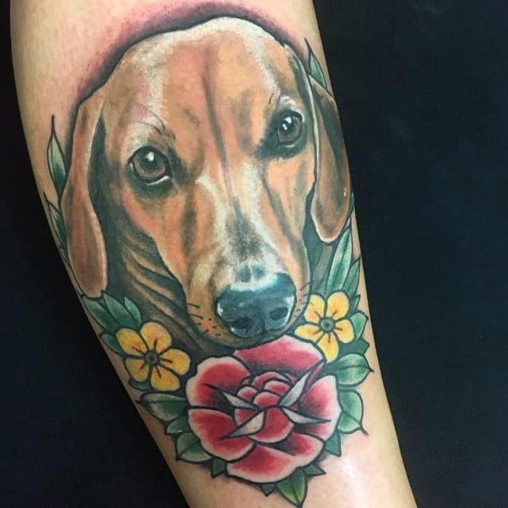 点击大图看下一张：小狗纹身图案 10张身体各部位的小狗纹身图案图片