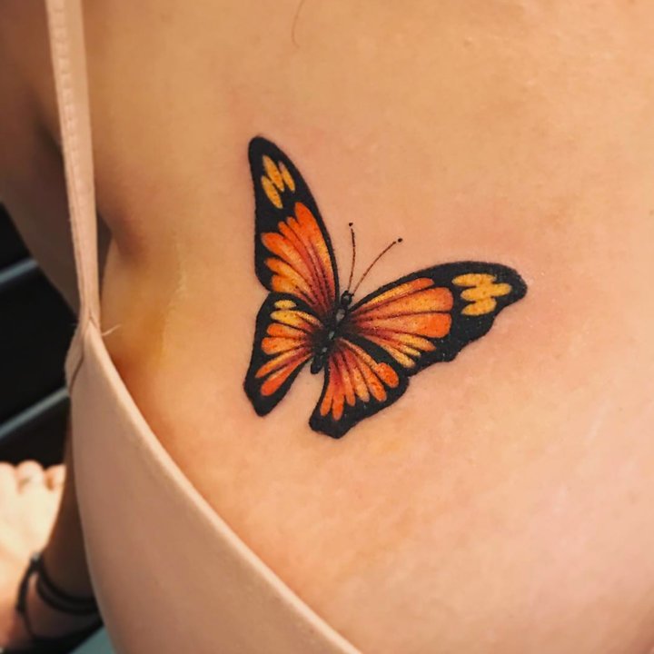 点击大图看下一张：蝴蝶纹身图案 10款多彩多姿的彩绘纹身花朵和蝴蝶纹身图案