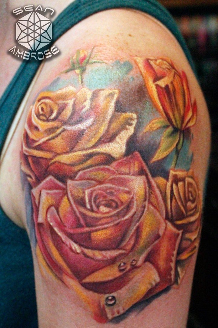 点击大图看下一张：玫瑰纹身图  艳丽动人而又色彩鲜艳的玫瑰纹身图案