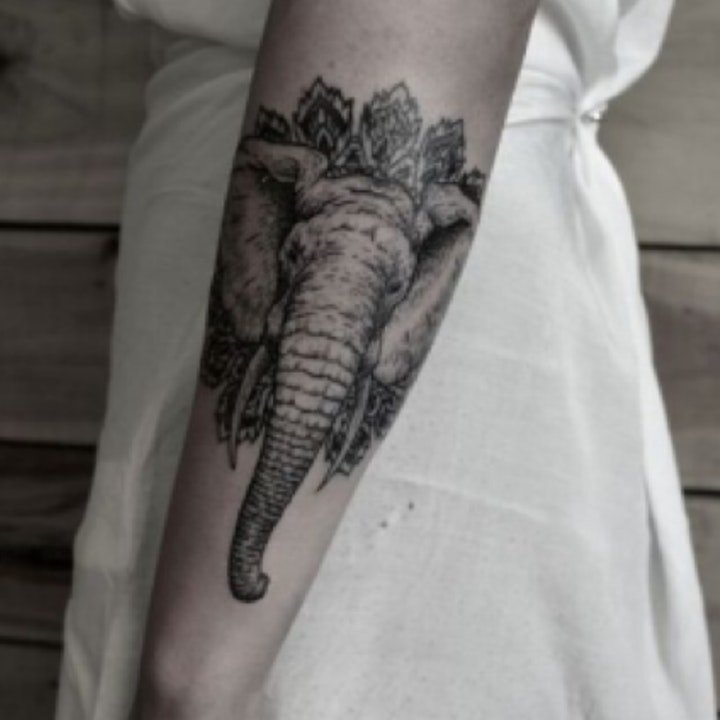 点击大图看下一张：小象纹身  9组温和而又憨厚的小象纹身图案