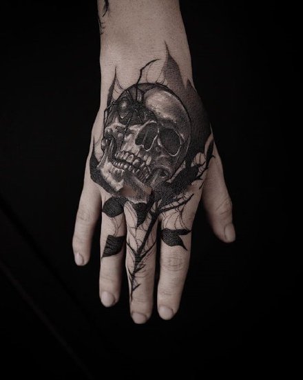 点击大图看下一张：暗黑纹身骷髅 9张暗黑风格的骷髅主题纹身图片